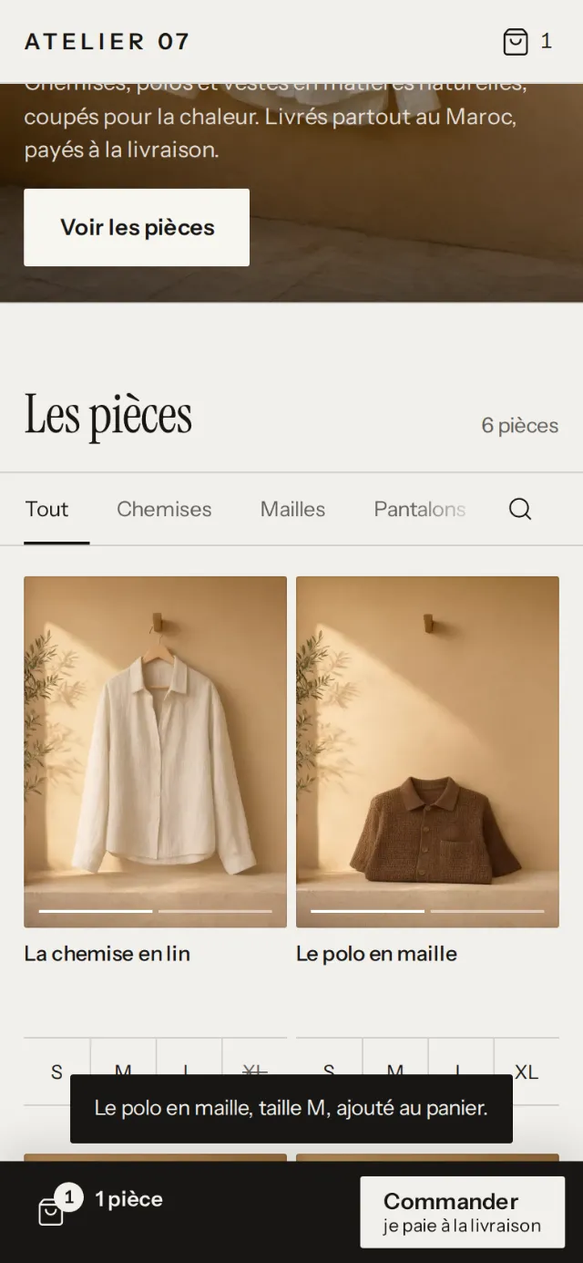 Le site d’Atelier 07 sur téléphone : le polo en maille ajouté au panier